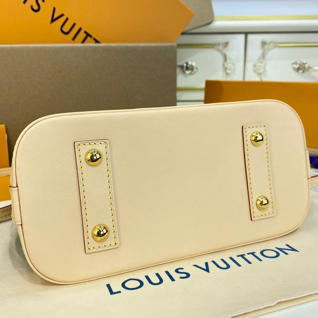 Louis Vuitton Alma Shell Handbag