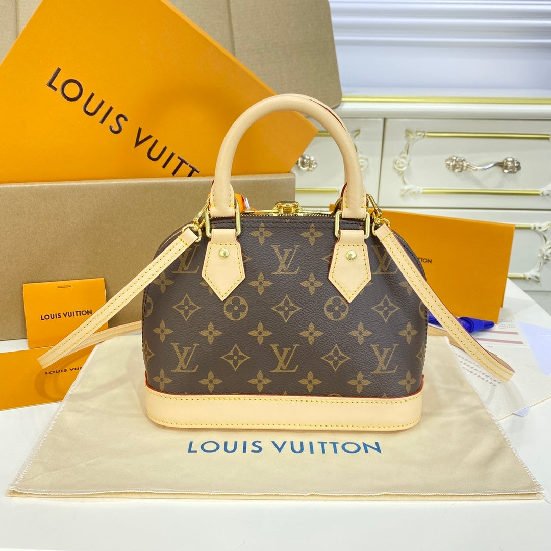 Louis Vuitton Alma Shell Handbag
