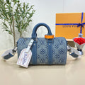 Louis Vuitton Keepall Bandoulière 25 Handbag