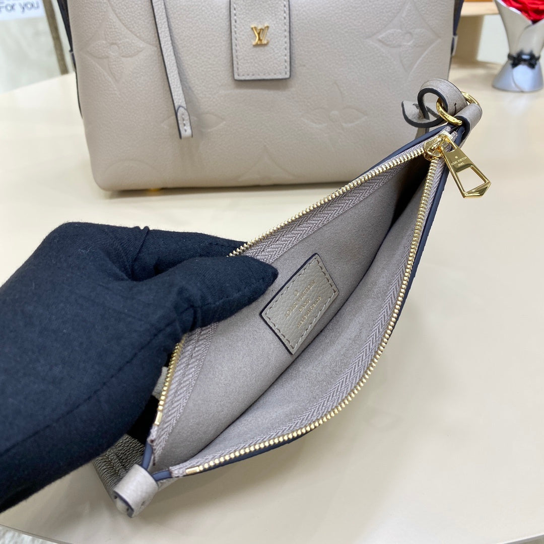 Louis Vuitton CarryAll Small Handbag