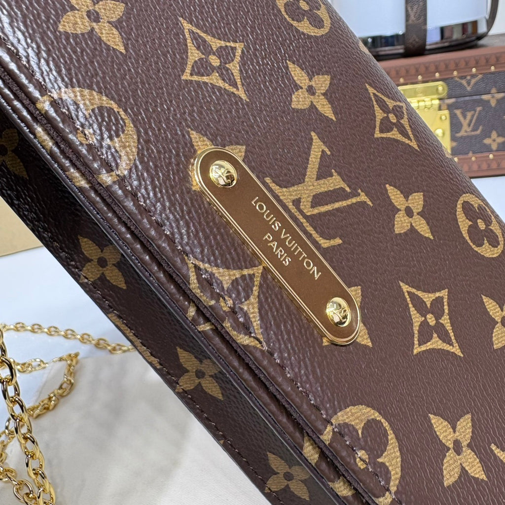 Louis Vuitton Lily WOC Handbag
