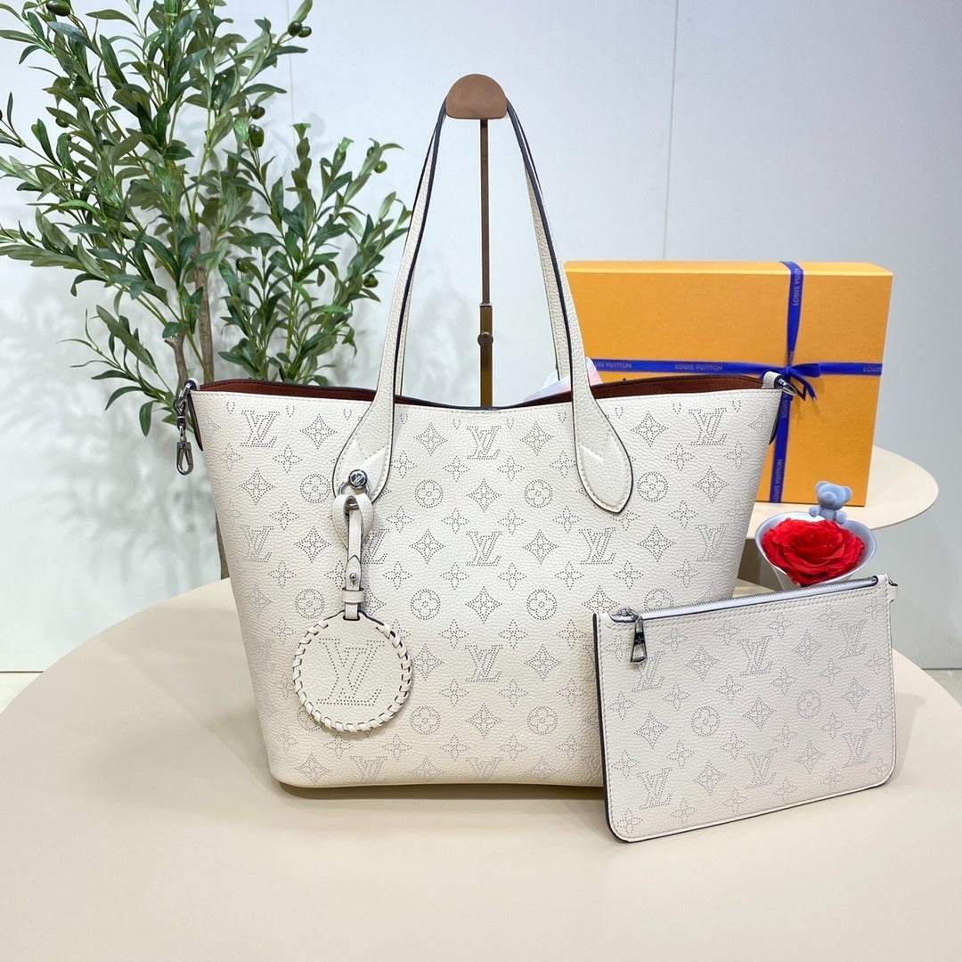 Louis Vuitton Mahina Perforated Flower Handbag PM