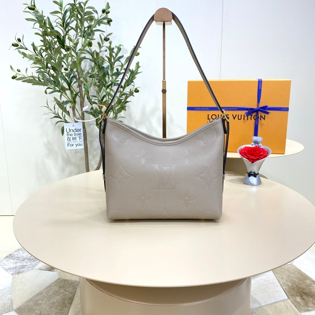 Louis Vuitton CarryAll Small Handbag