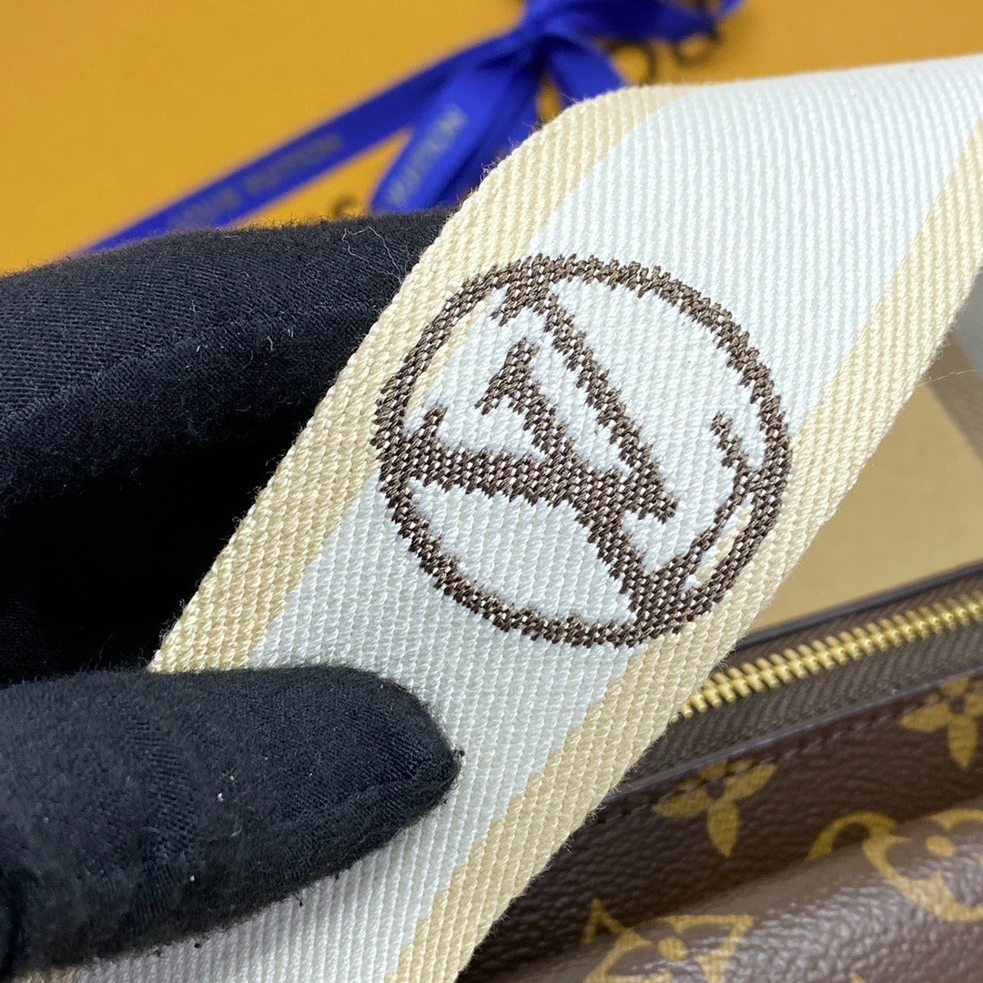 Louis Vuitton Vibe Handbag