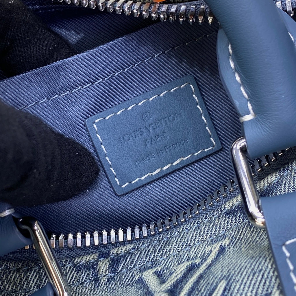 Louis Vuitton Keepall Bandoulière 25 Handbag