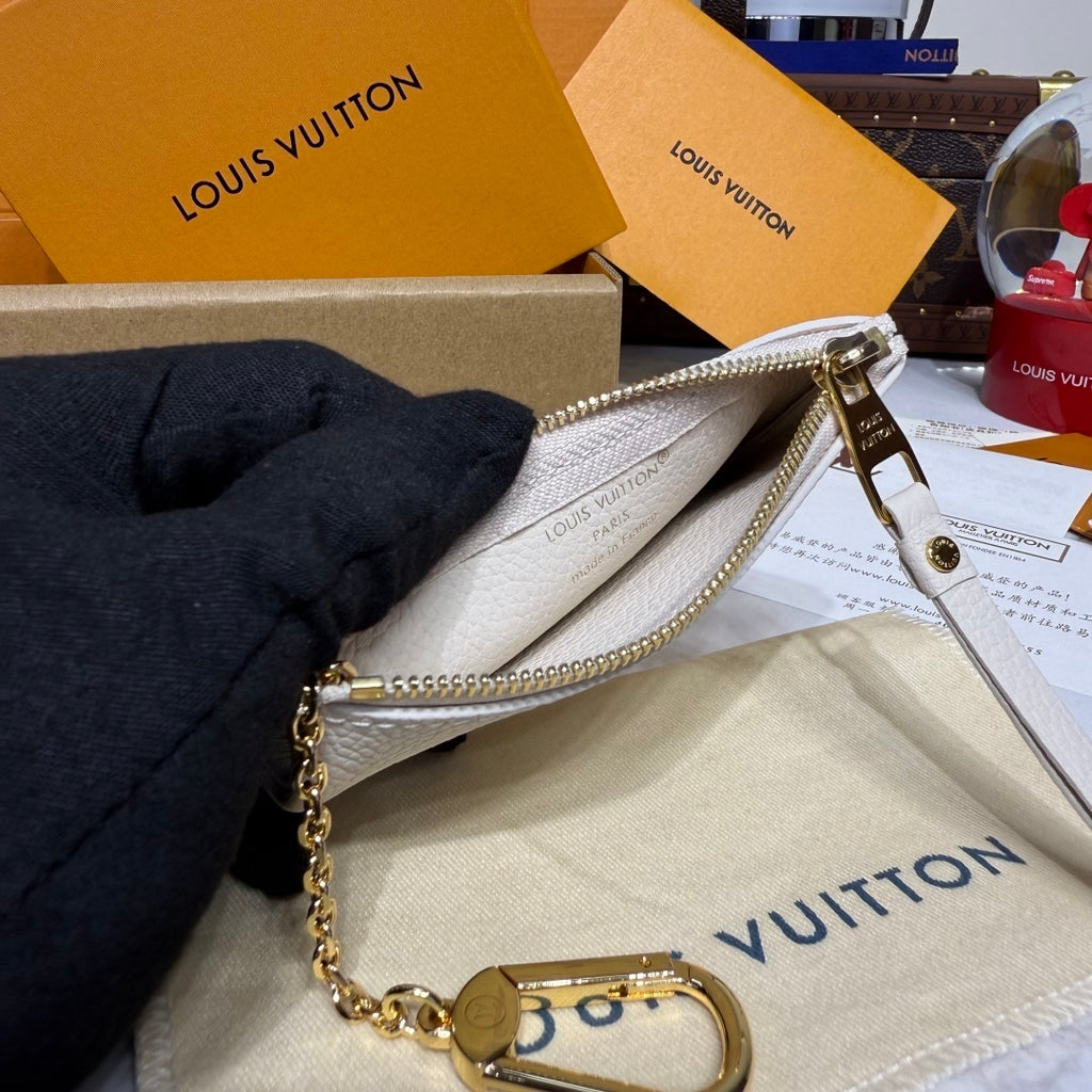 Louis Vuitton Empreinte Passport Holder