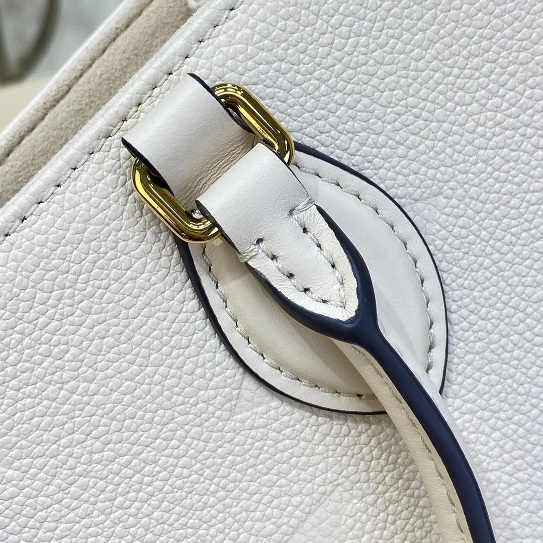 Louis Vuitton OnTheGo Small Reversible Monogram
