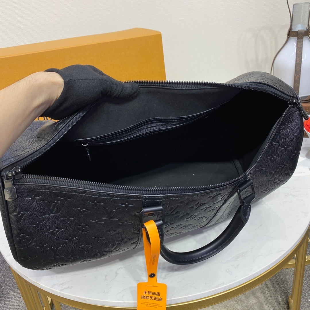 Louis Vuitton Keepall Bandoulière 50 Travel Bag (Embossed Leather)