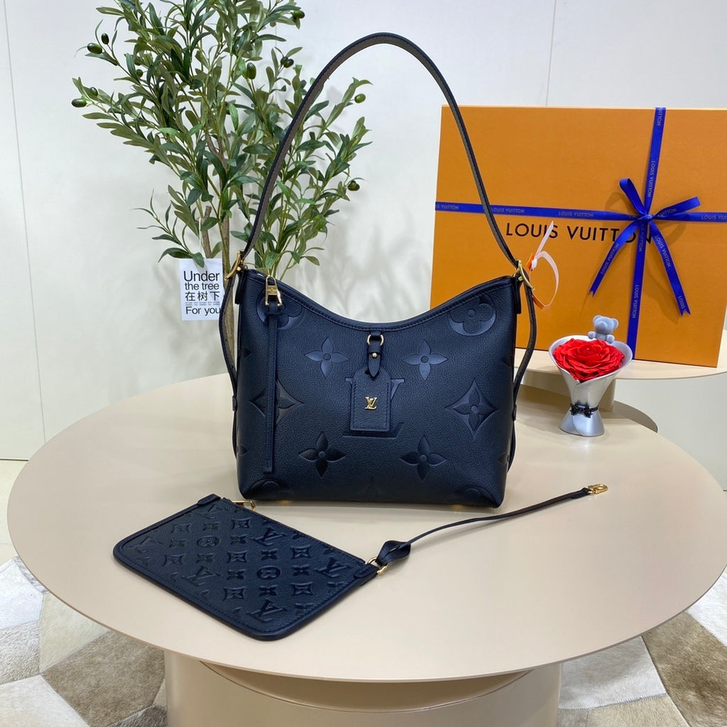 Louis Vuitton CarryAll Small Handbag