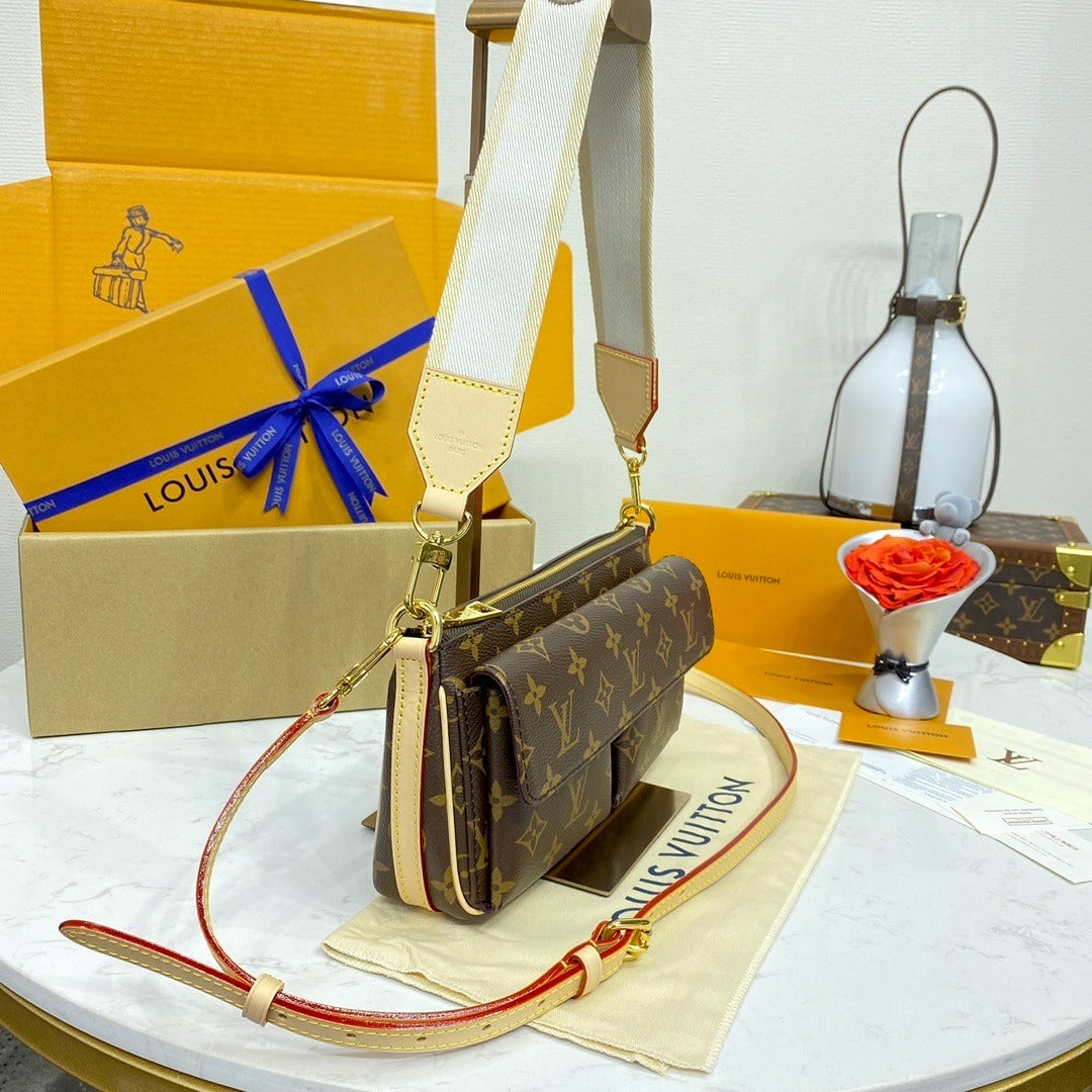 Louis Vuitton Vibe Handbag