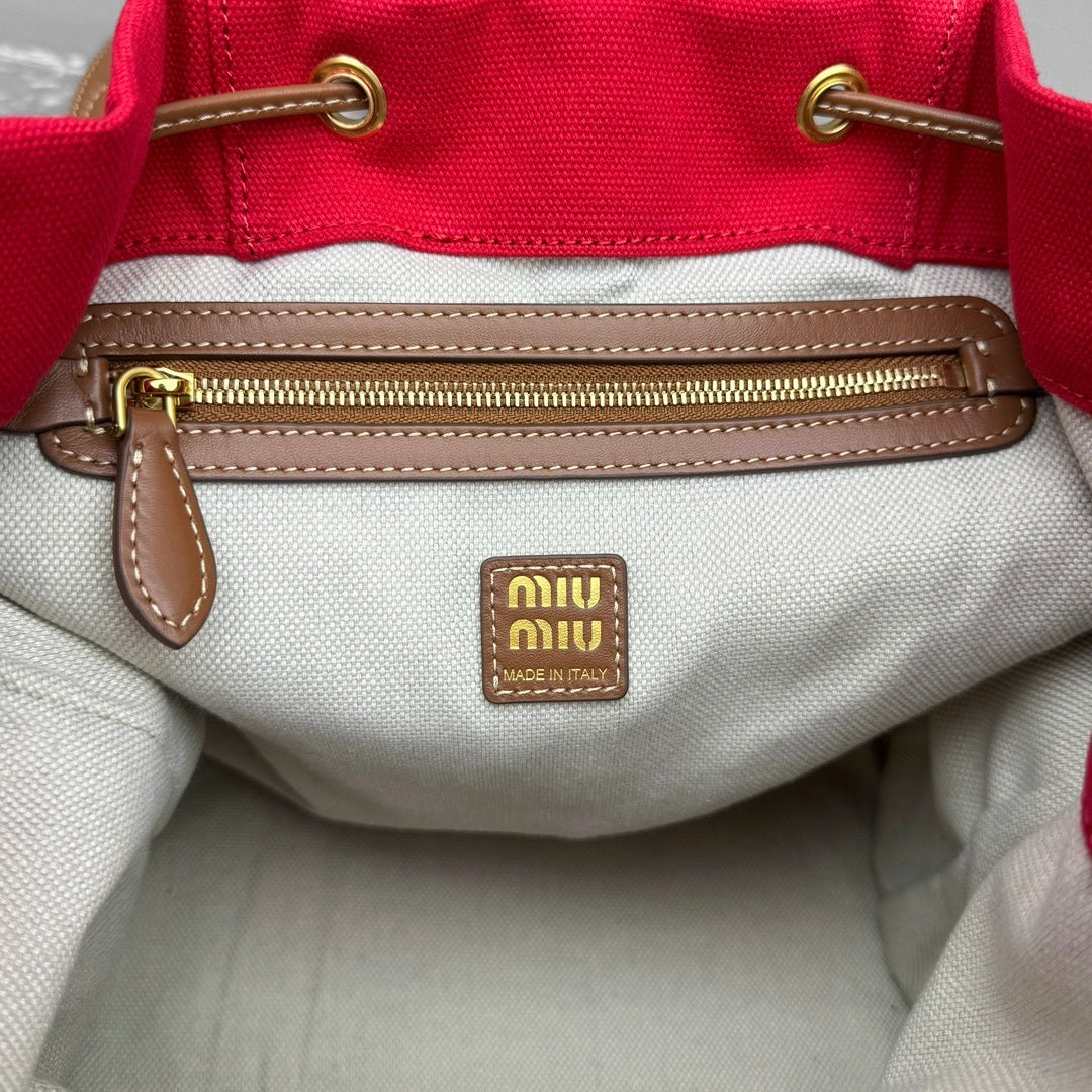 MIU MIU Canvas and Leather Backpack