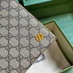 Gucci GG Supreme Clutch with GG Detail