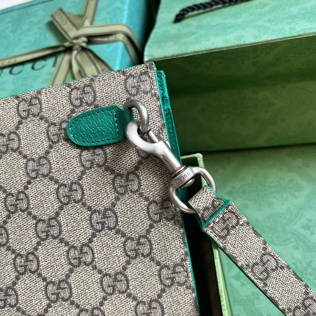 Gucci GG Supreme Clutch with GG Detail
