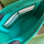 Gucci GG Supreme Clutch with GG Detail