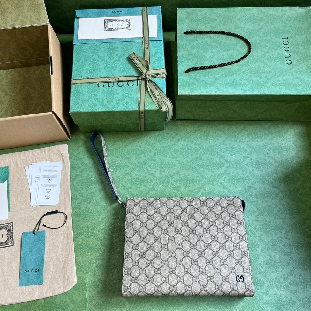 Gucci GG Supreme Clutch with GG Detail