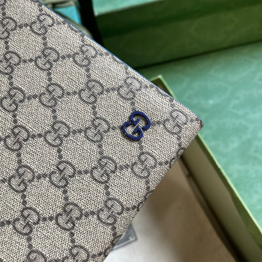 Gucci GG Supreme Clutch with GG Detail
