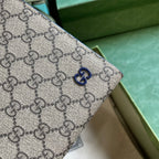 Gucci GG Supreme Clutch with GG Detail