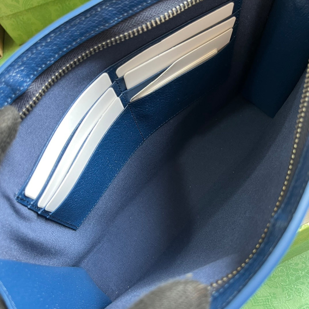 Gucci GG Supreme Clutch with GG Detail