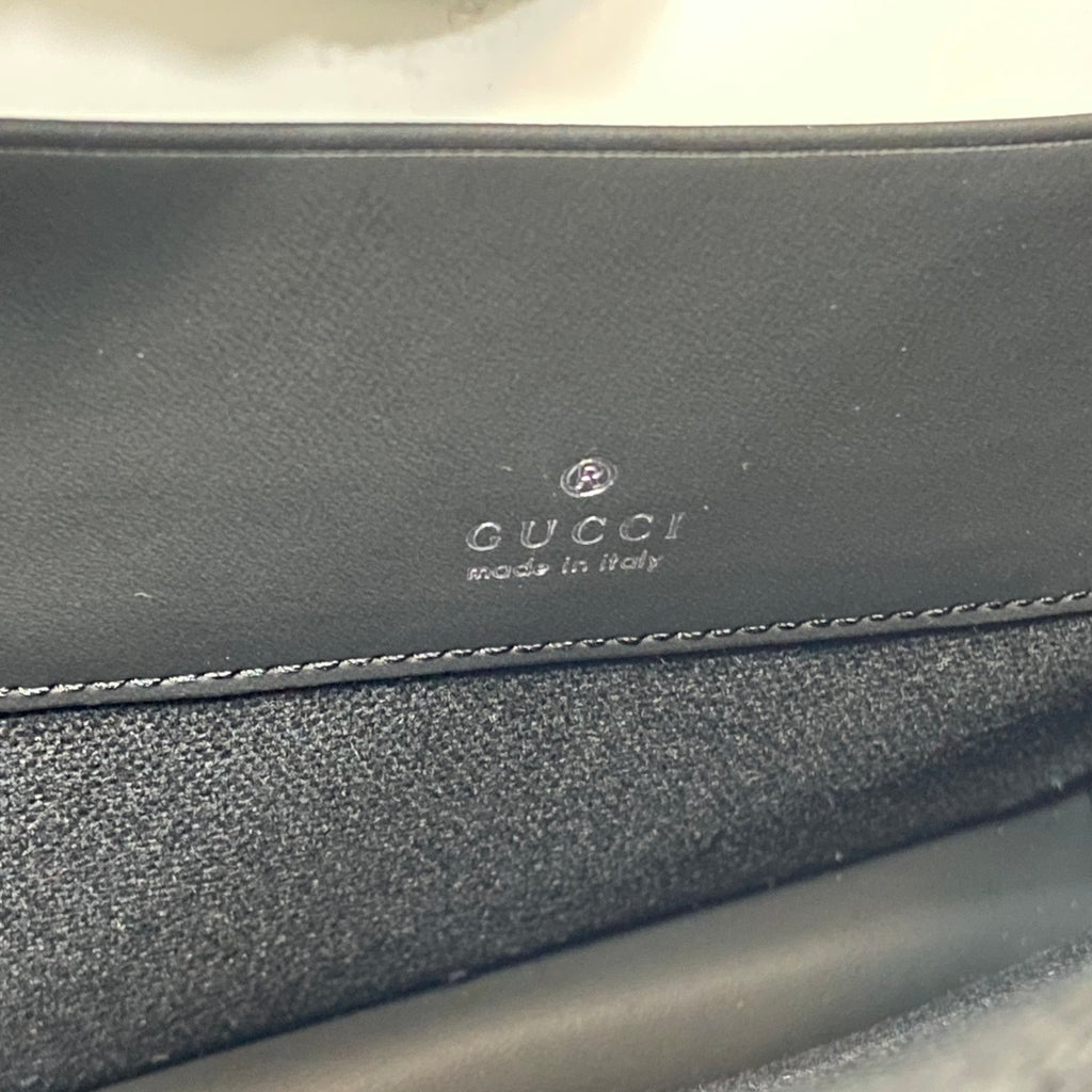 Gucci GG Rubber-Effect Clutch