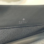 Gucci GG Rubber-Effect Clutch