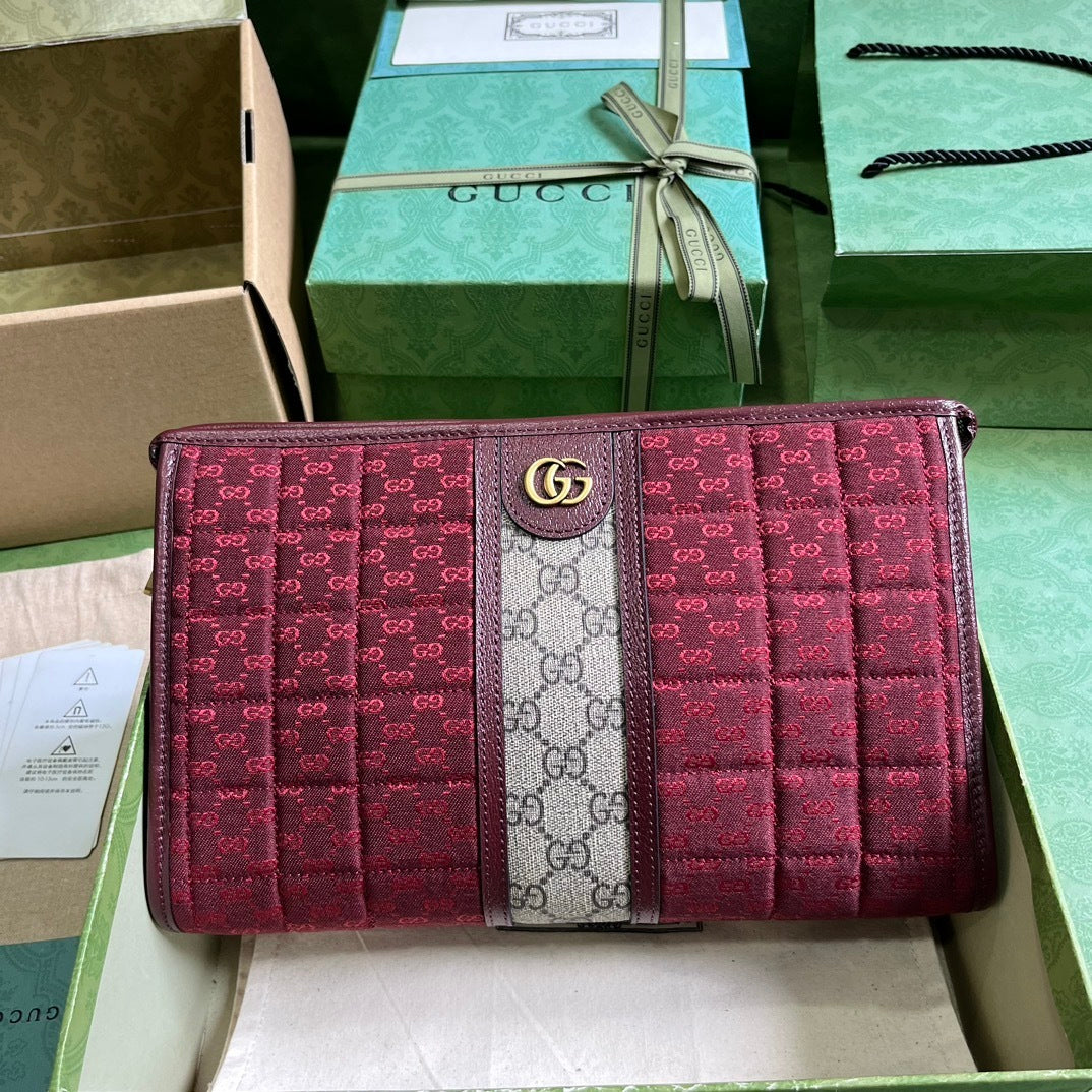 Gucci Mini GG Canvas Clutch