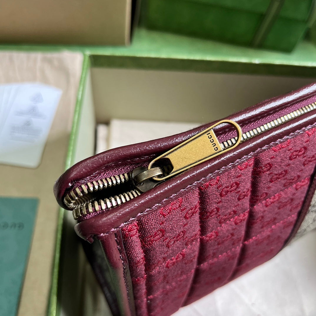 Gucci Mini GG Canvas Clutch