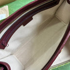 Gucci Mini GG Canvas Clutch