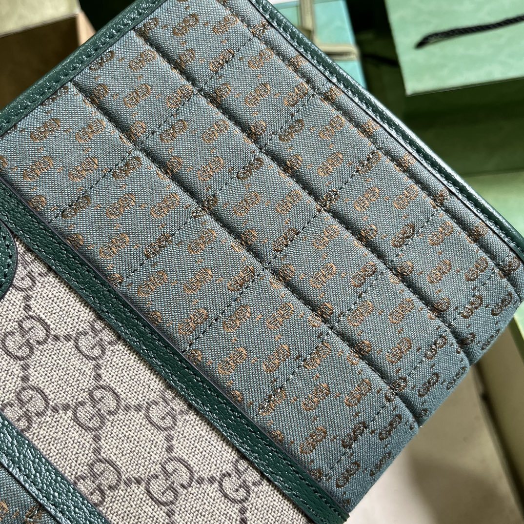 Gucci Mini GG Canvas Clutch
