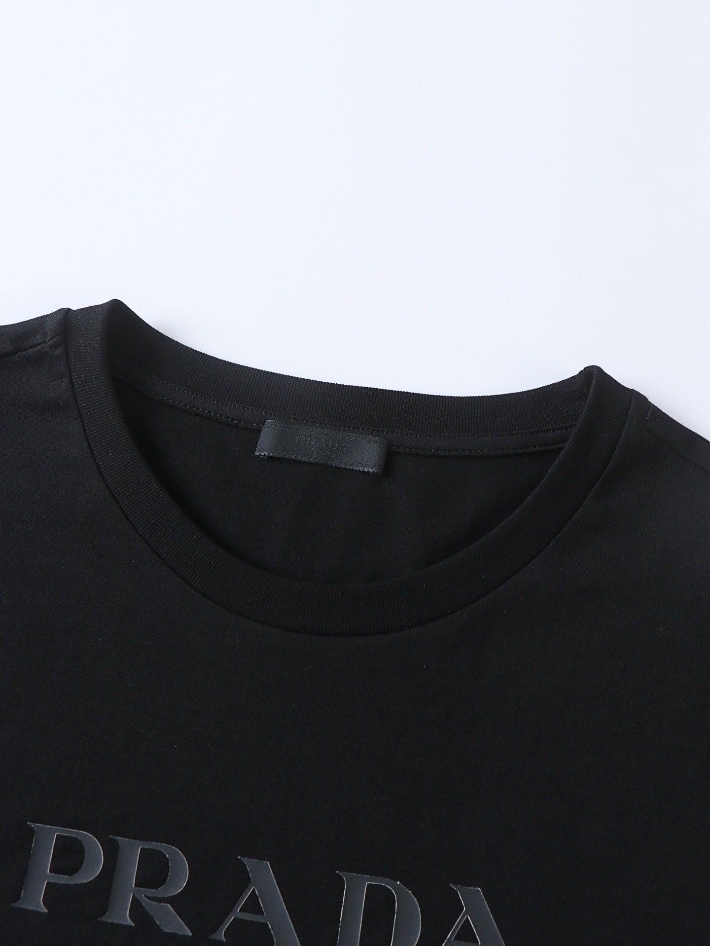 Prada Solid Color Embossed Crew Neck Short-Sleeve T-Shirt