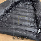 Moncler Midi-Length Down Jacket with Felt Badge