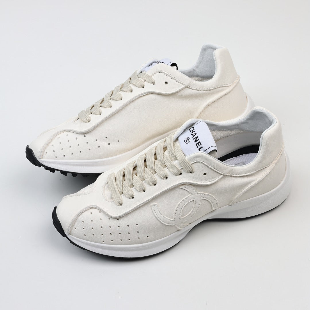 Chanel Interlocking CC Leather Sneakers