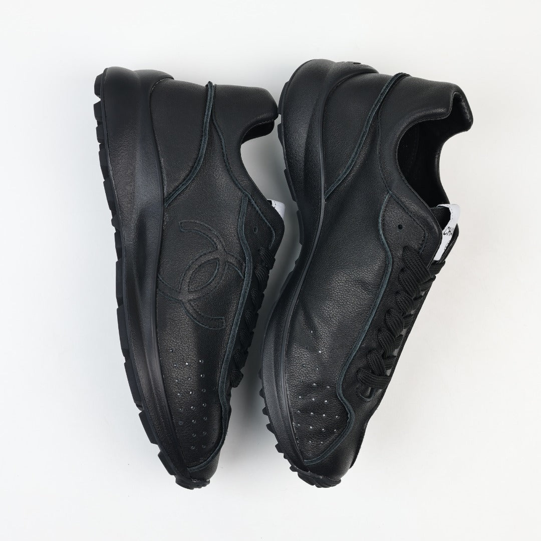 Chanel Interlocking CC Leather Sneakers