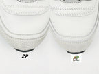 Chanel 25 Low-Top Sneakers