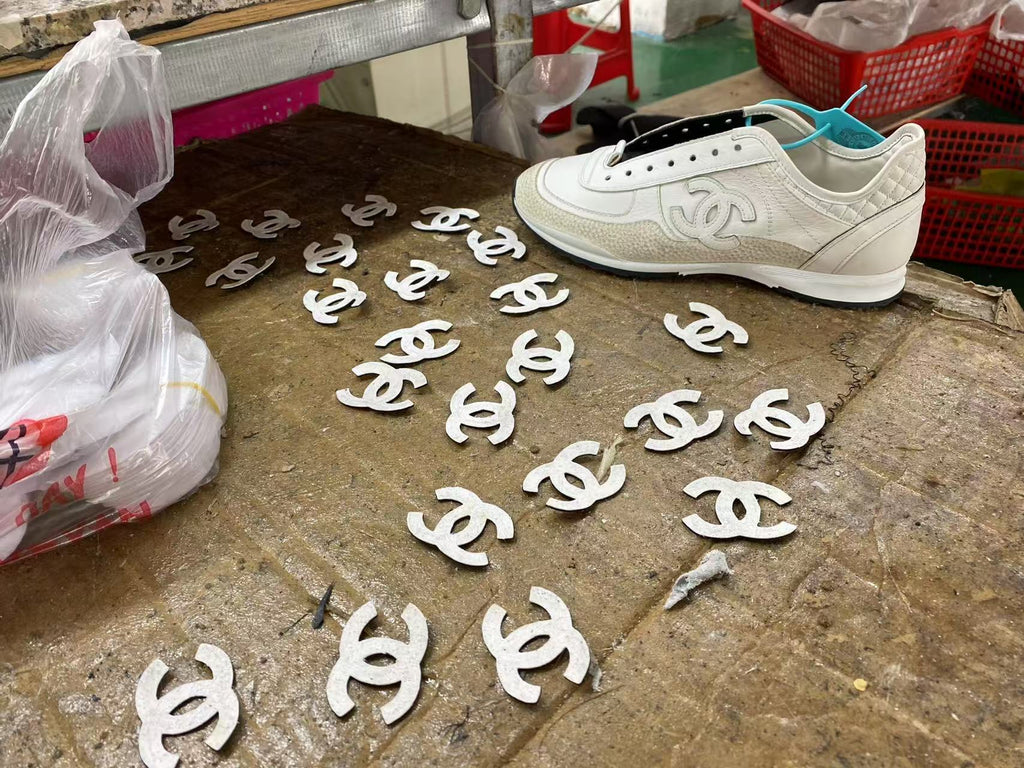 Chanel 25 Low-Top Sneakers