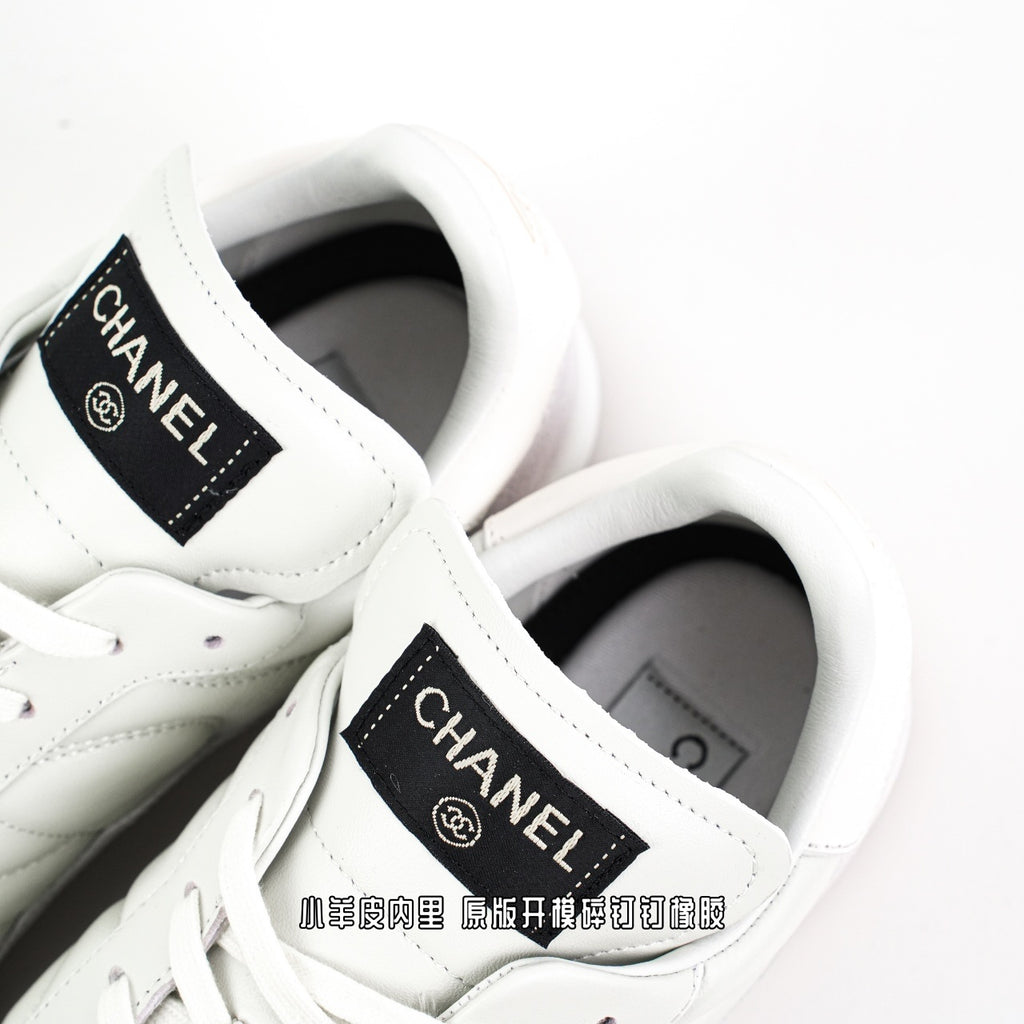 Chanel 25 Low-Top Sneakers