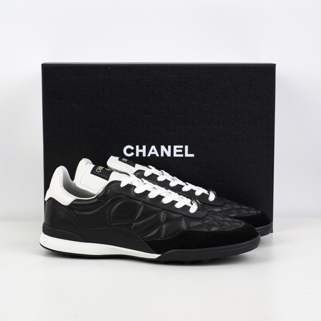 Chanel Calfskin & Suede Quilted Sneakers