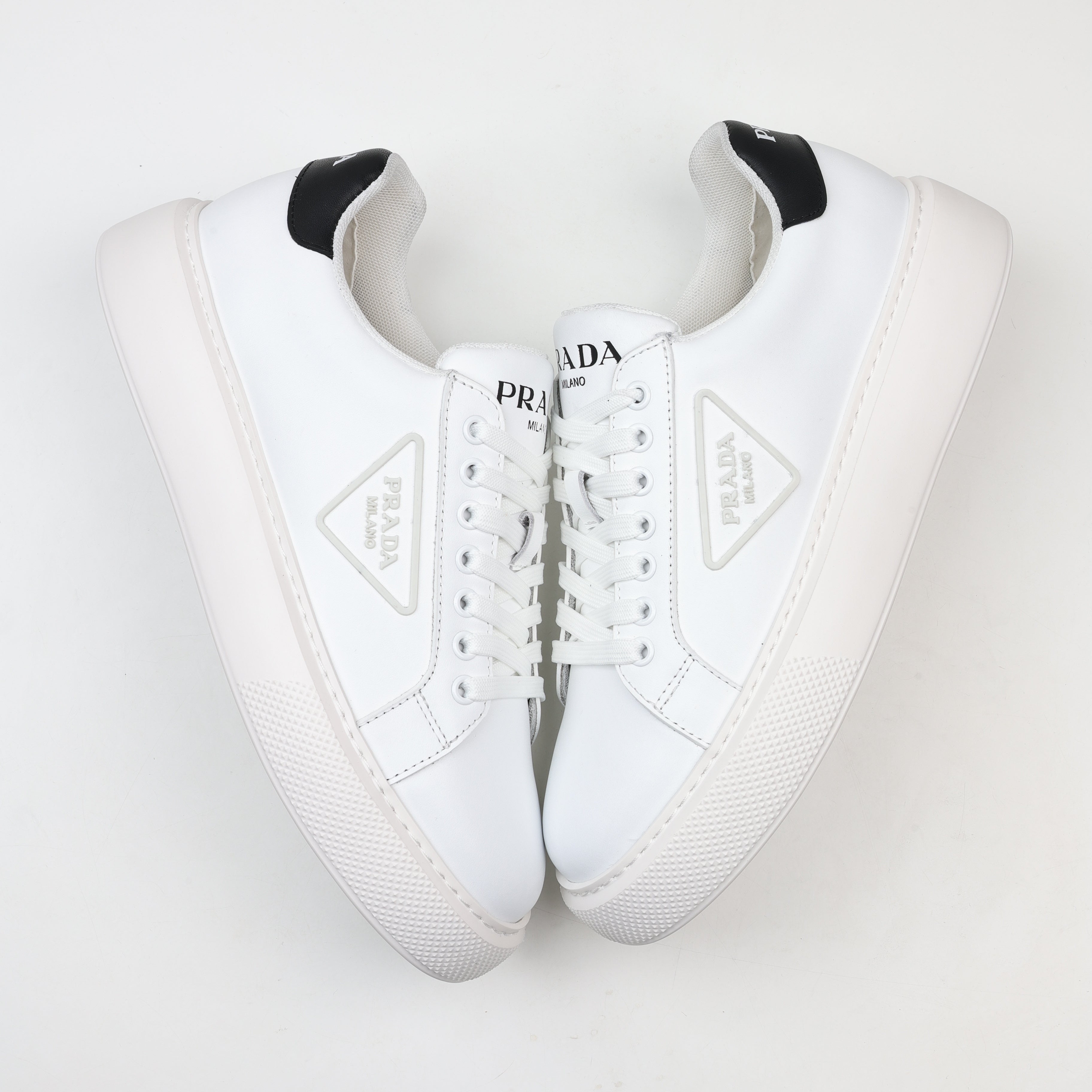 Prada Leather Platform Low-Top Sneakers