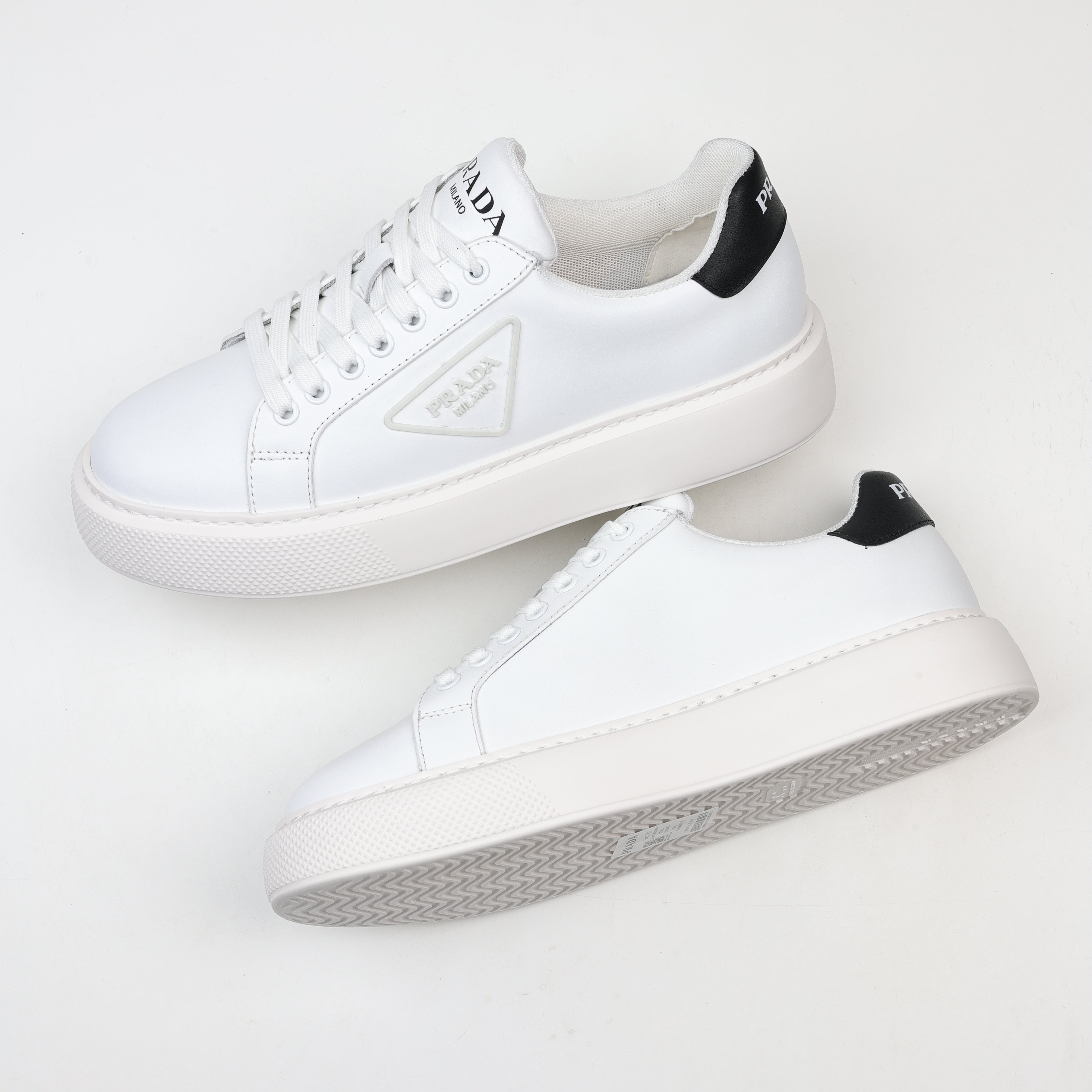 Prada Leather Platform Low-Top Sneakers
