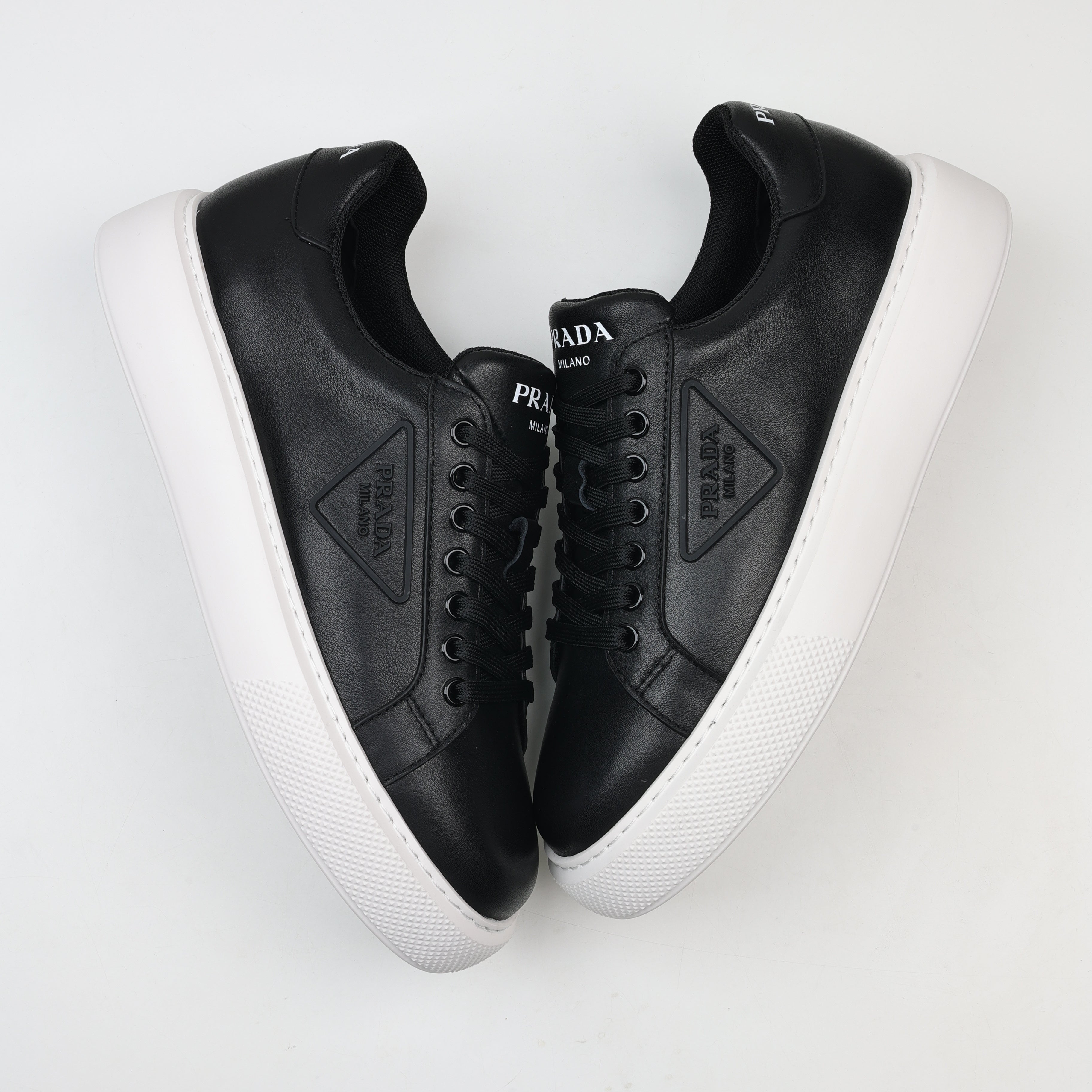Prada Leather Platform Low-Top Sneakers