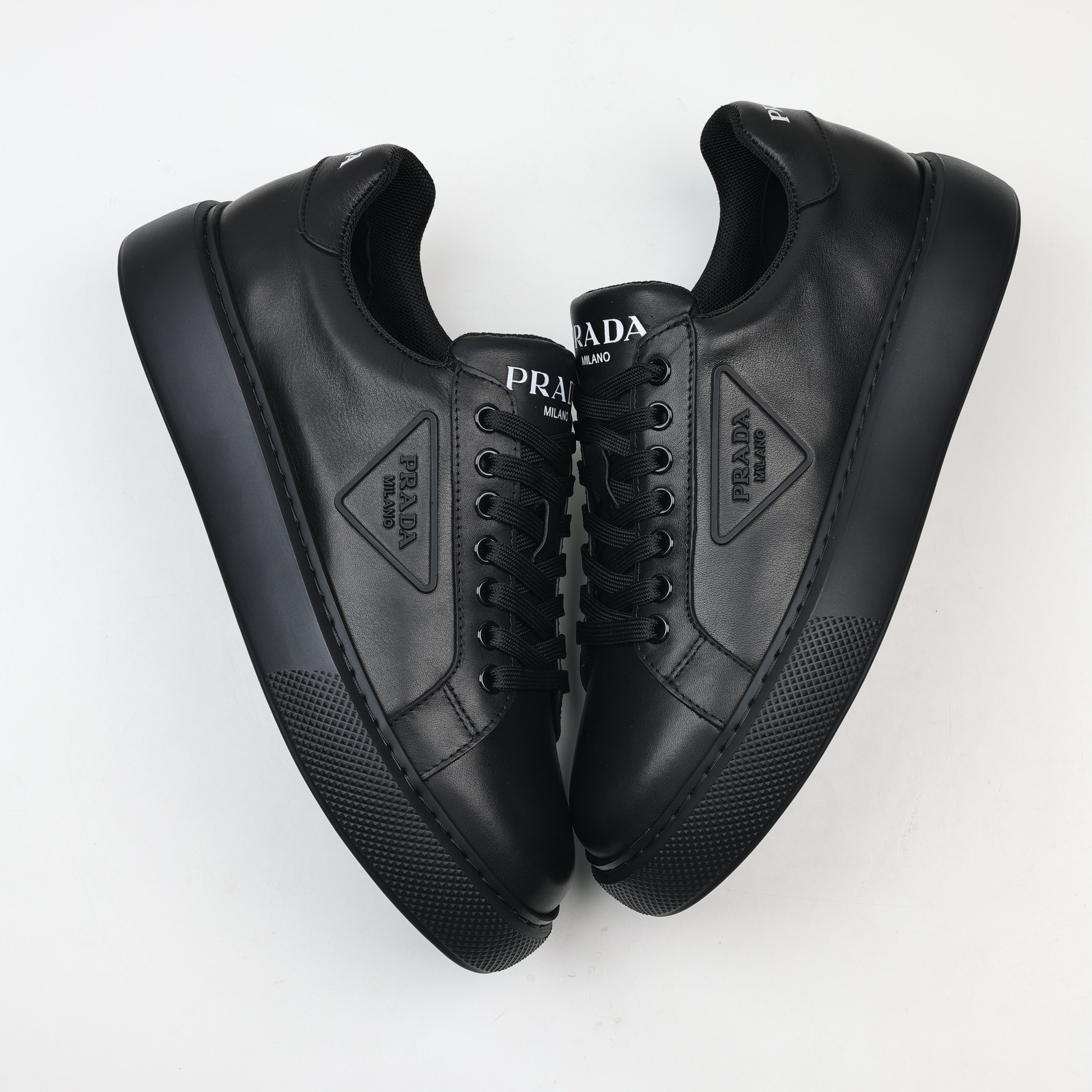 Prada Leather Platform Low-Top Sneakers