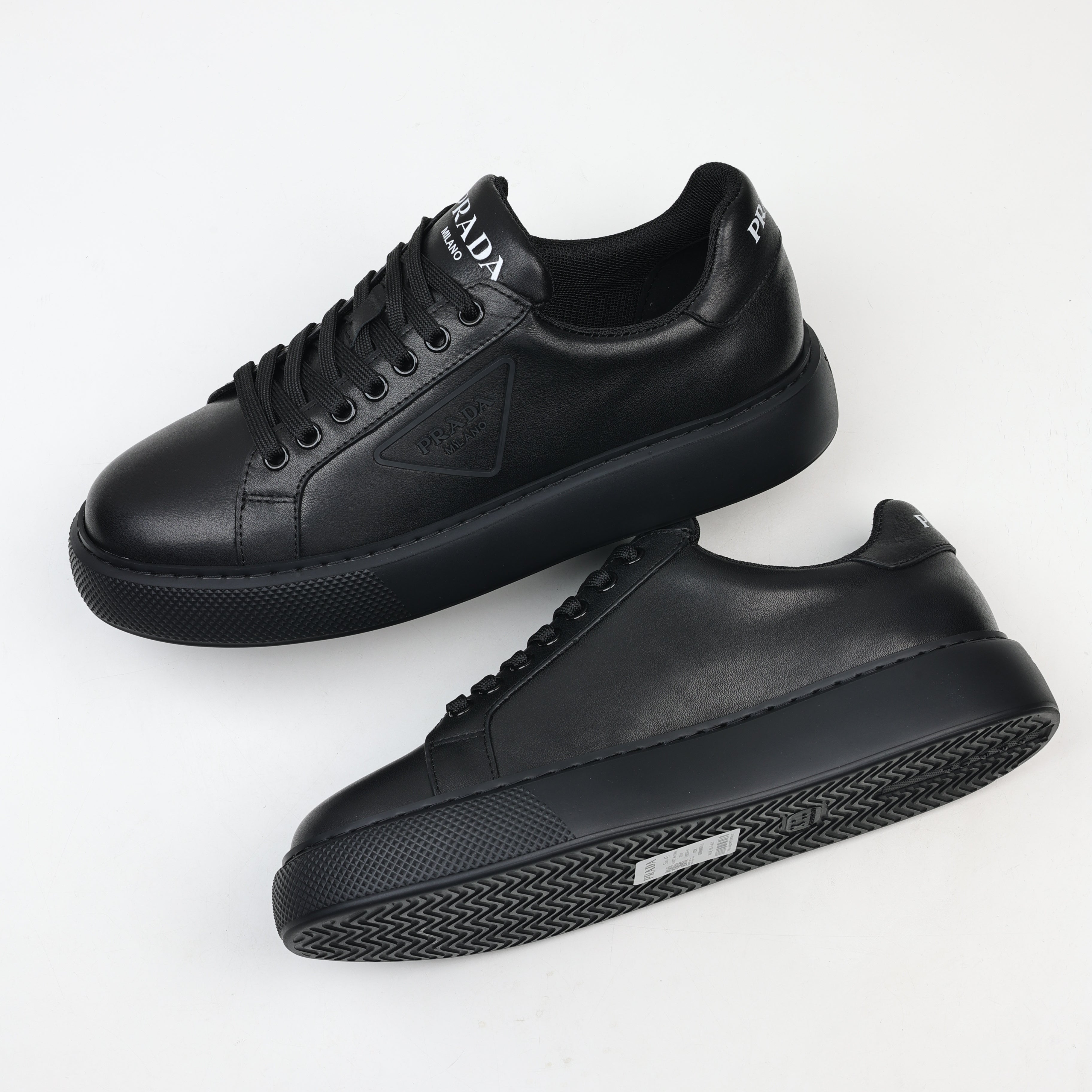 Prada Leather Platform Low-Top Sneakers