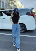 Louis Vuitton L Washed Distressed Denim Trousers