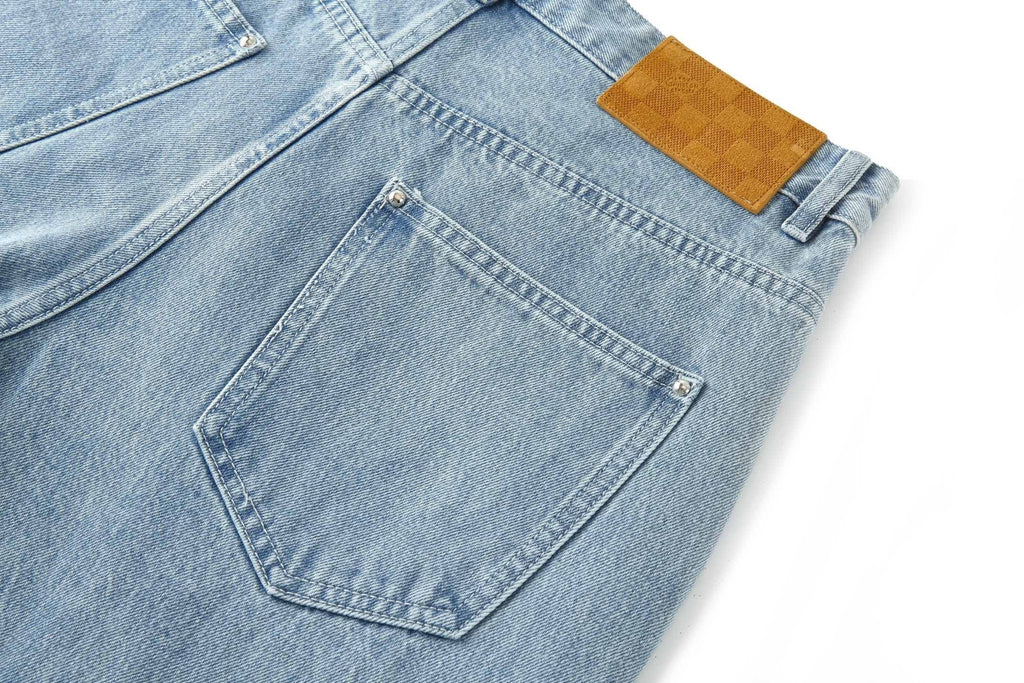 Louis Vuitton L Washed Distressed Denim Trousers