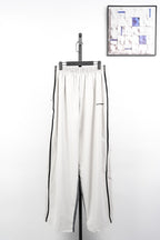 Balenciaga Runway Style Circular Embroidered Four-Color Trackpants