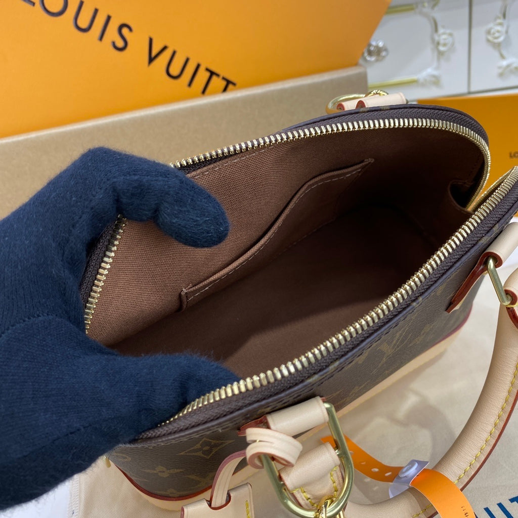 Louis Vuitton Alma Shell Handbag