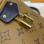 Louis Vuitton Just In Case Handbag