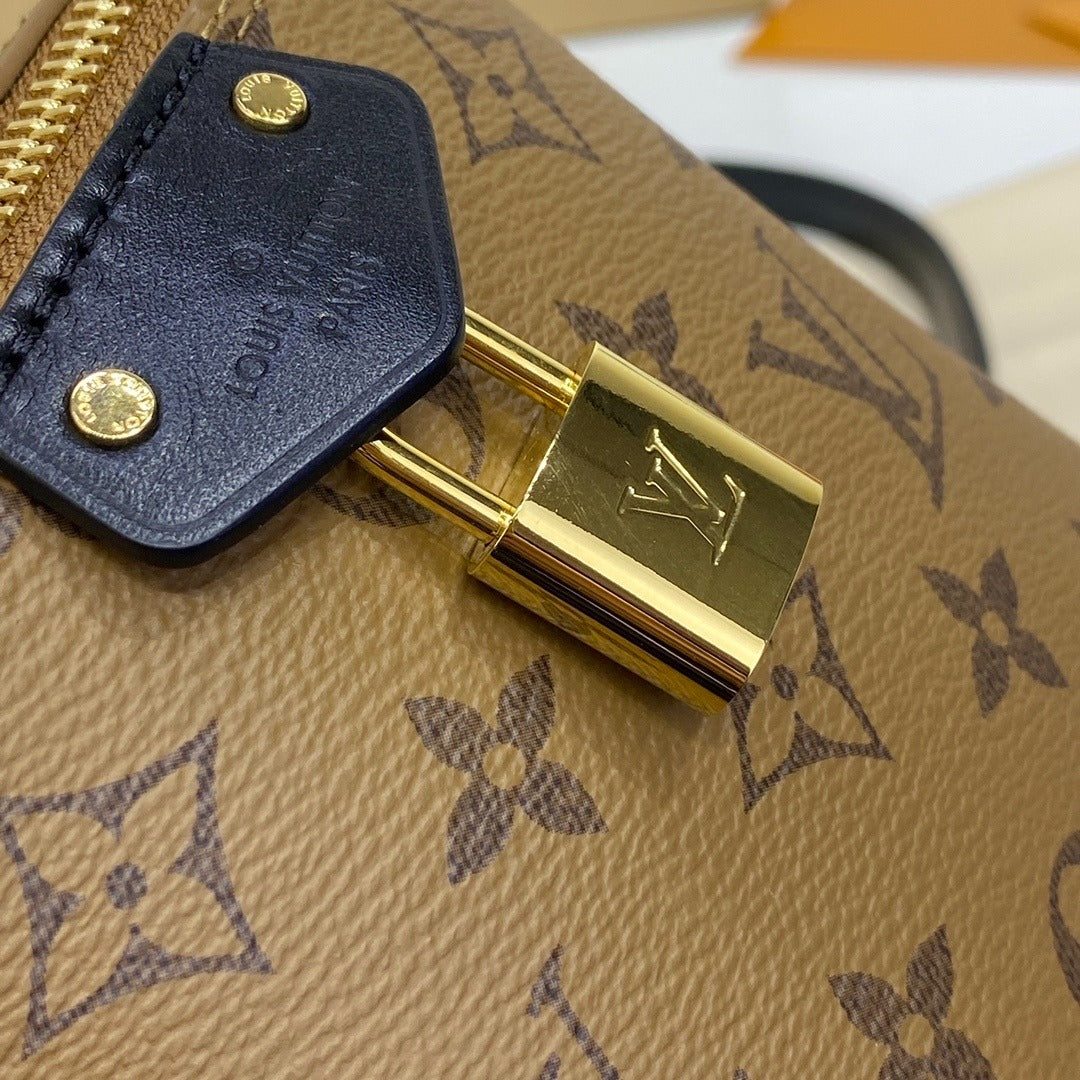 Louis Vuitton Just In Case Handbag