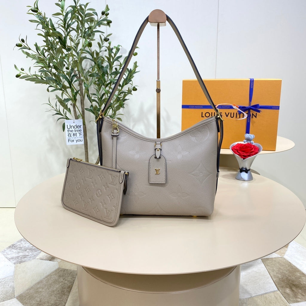 Louis Vuitton CarryAll Small Handbag