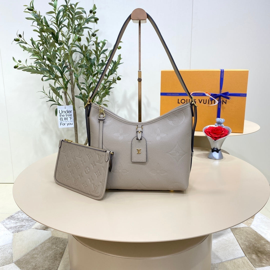 Louis Vuitton CarryAll Small Handbag