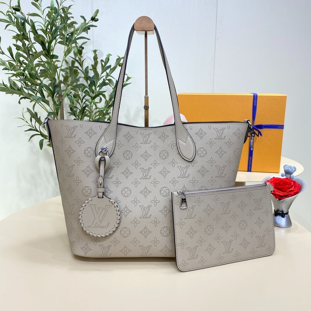 Louis Vuitton Mahina Perforated Flower Handbag PM